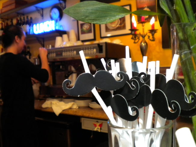 The Paradise Cafe in the Mendenhall Valley began serving alcoholic drinks on Saturday. Mustaches serve as the logo for the cafe's new addition nicknamed "The Handle Bar." (Photo by Kevin Reagan/ KTOO)