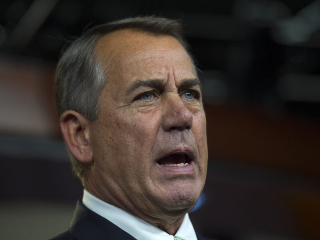 House Speaker John Boehner of Ohio speaks during a news conference on Capitol Hill in Washington, on Thursday. Molly Riley/AP