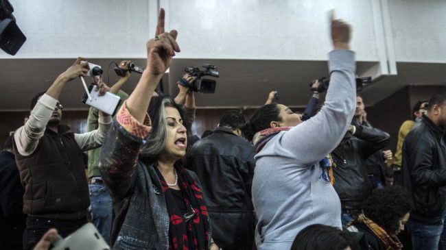 Relatives and supporters of Egyptian activist Alaa Abdel Fattah react after Monday's verdict in a trial over an illegal protest. Khaled Desouki/AFP/Getty Images