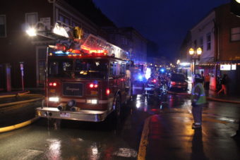 Capital City Fire/Rescue battles Saturday's fire at the Gastineau Apartments building. (Photo by Mikko Wilson/KTOO)