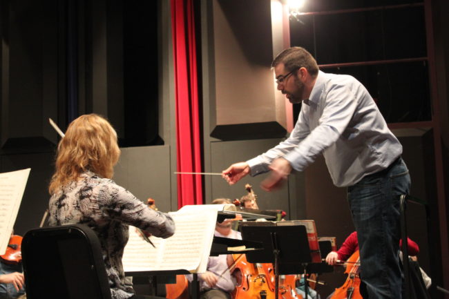 Jeremy Briggs Roberts rehearsed with The Juneau Symphony Tuesday night. (Photo by Lisa Phu/KTOO)