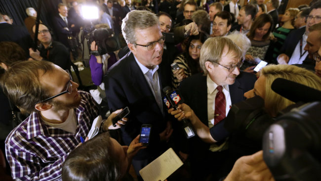 Former Florida Gov. Jeb Bush speaks to members of the media during a two-day swing through Iowa that had all the trademarks of a presidential campaign. Charlie Neibergall/AP