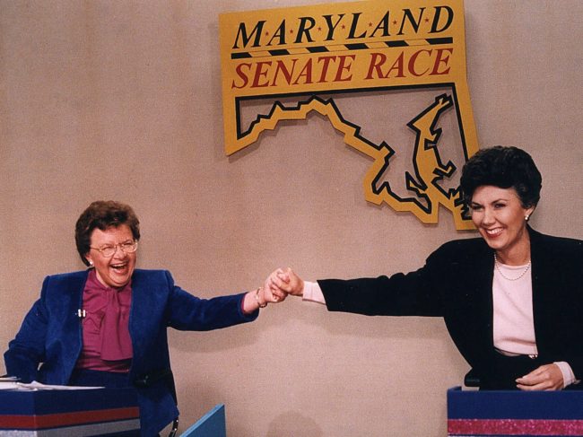 Mikulski, left, and her then-opponent Linda Chavez hold hands before the Maryland Senate candidates debate in 1986. J. Scott Applewhite/AP