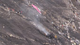 An image from AFP TV video taken Tuesday shows smoke billowing from scattered debris of the Germanwings Airbus A320 at the crash site in the French Alps above the town of Seyne-les-Alpes, France. Denis Bois/AFP/Getty Images