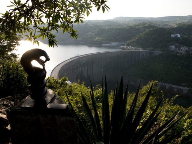 In the 1950s, the World Bank funded the creation of the world's largest man-made dam, the Kariba Dam, which sits on the border of Zimbabwe and Zambia. The construction of such dams can have dire consequences for poor people living near a river, an investigation found. (Photo by Jekesai Njikizana/AFP/Getty Images)