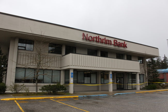 Northrim Bank's entrance is blocked by police tape after the robbery (photo by Elizabeth Jenkins/KTOO) 