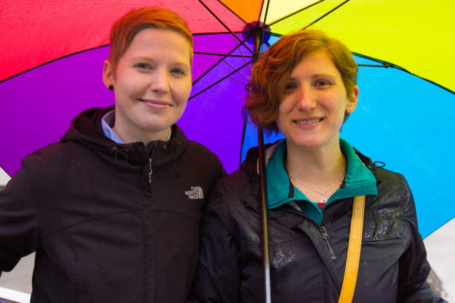 Kimberly and Marguerite Crawford attended the rally. They were married twice - once outside the Dimond Courthouse in 2012 and again in Connecticut in 2013. (Photo by David Purdy/KTOO)