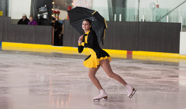 Shelby Hydock performs to Singin’ in the Rain at the Juneau Skating Club spring recital. (Photo by Steve Quinn)