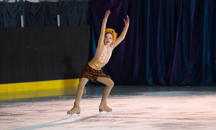 Kara Hort performs to Lion King’s I Just Can’t Wait to Be King during the Juneau Skating Club’s recital. (Photo by Steve Quinn)