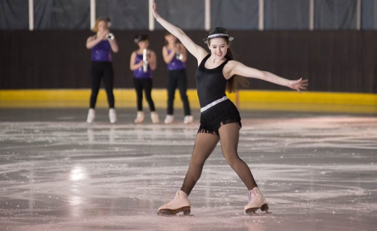Laurie Balstad cuts hard during a group performance under the heading At The Cabaret during the Juneau Skating Club spring recital. (Photo by Steve Quinn)
