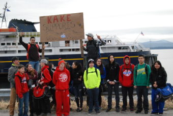 Students protest cuts in the marine highway system budget at the Kake ferry terminal in March.