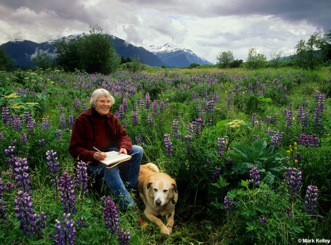 Rie Muñoz with her dog Muncie in the Mendenhall Wetlands, Juneau in 2008. (Photo by Mark Kelley)
