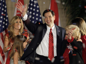 Marco Rubio celebrates on stage with his family in 2010 after winning his U.S. Senate seat in Florida when he was just 39 years old. Now, he's expected to embark on a run for president. (Photo by Alan Diaz/AP)