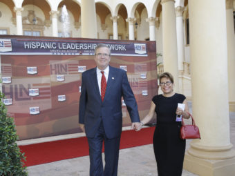 Former Florida Gov. Jeb Bush and his wife, Columba, arrive at the Hispanic Leadership Network conference on April 18, 2013, in Coral Gables, Fla. (Photo by Wilfredo Lee/AP)