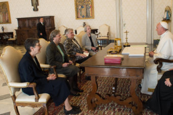 Pope Francis talks with a delegation of the Leadership Conference of Women Religious at the Vatican on Thursday. The Vatican announced the unexpected conclusion of a controversial overhaul of the main umbrella group of U.S. nuns. (Photo by L'Osservatore Romano/AP)