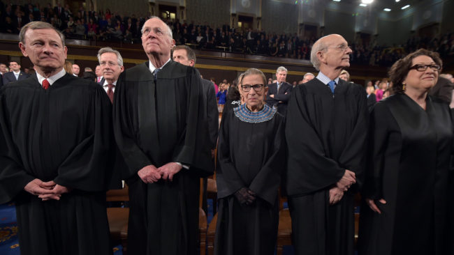 Chief Justice John Roberts (from left) and Justices Anthony M. Kennedy, Ruth Bader Ginsburg, Stephen G. Breyer and Sonia Sotomayor at the State of the Union address earlier this year. (Photo by Mandel Ngan/AP)