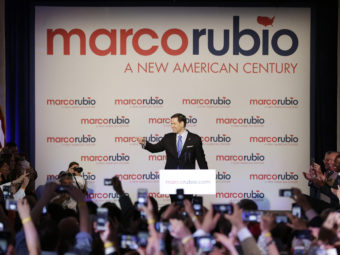 Florida Sen. Marco Rubio waves at supporters in Miami Monday. (Photo by Wilfredo Lee/AP)