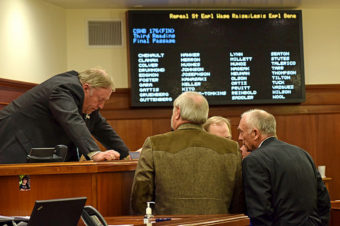 House Speaker Mike Chenault, R-Nikiski (left) confers with other members of the House leadership just before the vote on House Bill 176, April 15, 2015. The bill repeals a 2.5 percent pay raise for non-union state employees scheduled to take effect July 1, 2015. (Photo by Skip Gray/360 North)