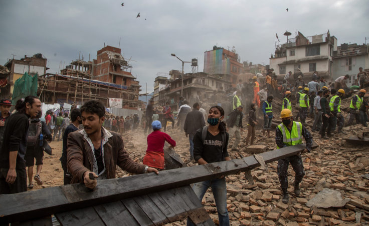 Emergency rescue workers clear debris in Basantapur Durbar Square while searching for survivors in Kathmandu, Nepal, Saturday. (Photo by Omar Havana/Getty Images)