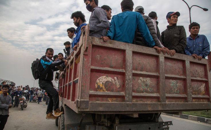 Residents are evacuated in a truck in Kathmandu on Sunday