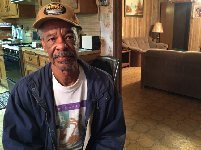 Carlton Scott pays $266.99 per month for his subsidized health insurance plan. He worries he and his neighbors would lose their insurance without the subsidy. (Photo by Jeff Cohen/WNPR)