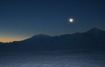 UAF oceanographer Mark Johnson is in Svalbard teaching and doing sea ice research. Last week, he captured this photo of a total eclipse of the sun from a remote fjord south of Longyearbyen. Venus is the planet at top left. (Photo by Mark Johnson/UAF)