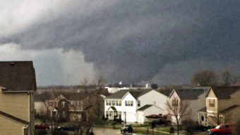 A tornado in Kirkland, Ill., on Thursday. One person was killed in the community of Fairdale, officials said. (Photo by Emily Mains/AP)