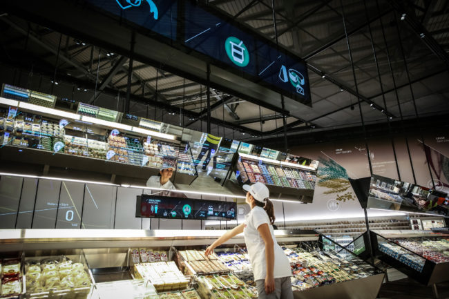 Carlo Ratti of MIT designed this "supermarket of the future" exhibit. If you move a hand close to a product, a digital display lights up, providing information on origin, nutritional value and carbon footprint. Courtesy of COOP Italia