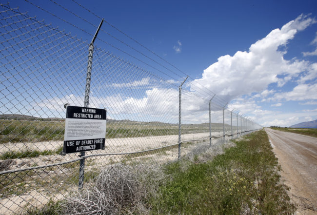 A security fence surrounds the main part of the U.S. Army's Dugway Proving Ground, a testing laboratory in the Utah desert. The Army says it mistakenly shipped live anthrax from Dugway to several labs in the U.S. and Korea. George Frey/Getty Images