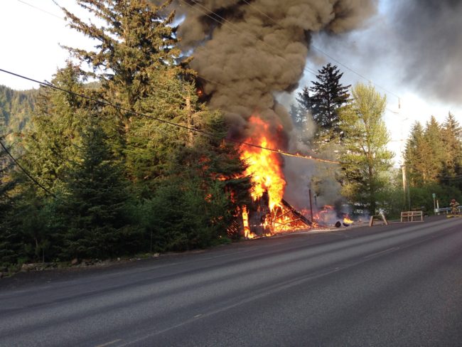 A structure fire along  North Douglas Highway near mile 3, May 14, 2015. (Photo by Casey Kelly/KTOO)