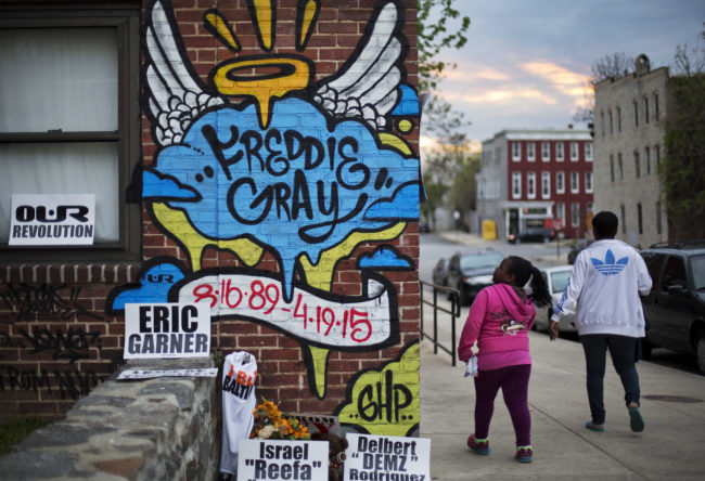 Public memorials, like the one at the scene where Freddie Gray was arrested, have also become sites to commemorate other deaths of unarmed black men in similar police encounters across the country. David Goldman/AP