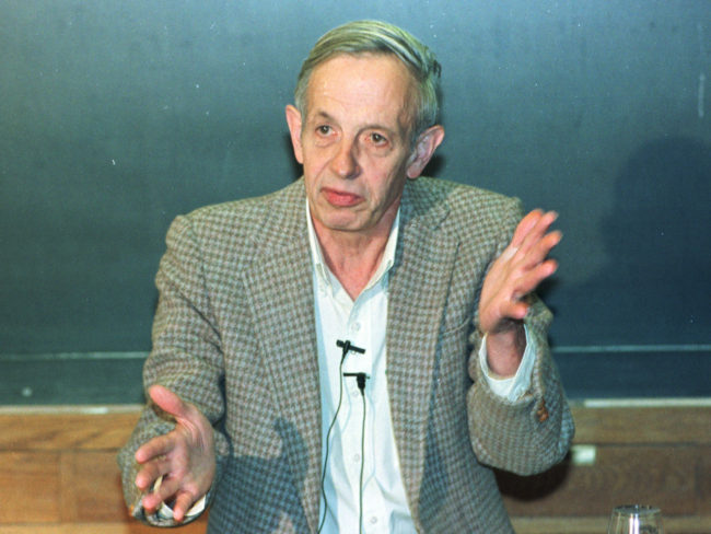 Princeton University professor John Nash speaks during a news conference at the university in Oct. 1994 after being named the winner of the Nobel Prize for economics. Charles Rex Arbogast/AP