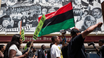 Protesters march from the Gilmor Homes, where Freddie Gray was arrested, to City Hall on Saturday in Baltimore (Photo by Andrew Burton/Getty Images)