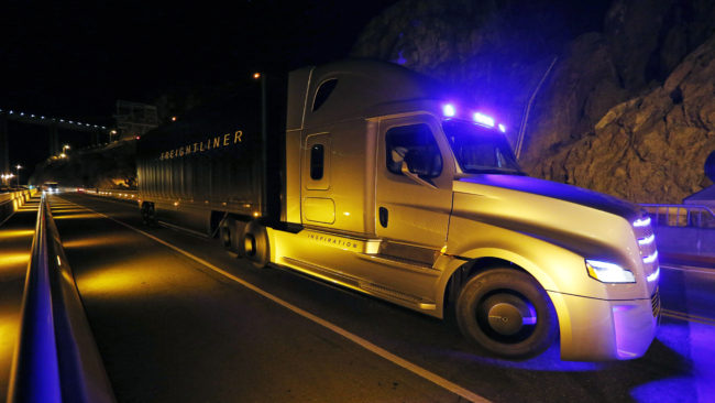 The Daimler Freightliner Inspiration, a self-driving long-haul truck, is seen during an event at the Hoover Dam, May 5, 2015, near Boulder City, Nev. John Locher/AP
