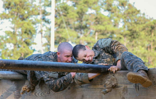 U.S. Army Soldiers conduct the Darby Mile buddy run and an obstacle course during the first gender-integrated Ranger Course at Fort Benning, Ga. Among the 400 students, 19 are women. Pfc. Antonio Lewis/U.S. Army