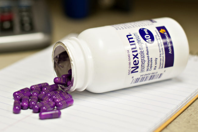 Photo of Nexium pill bottle & pills