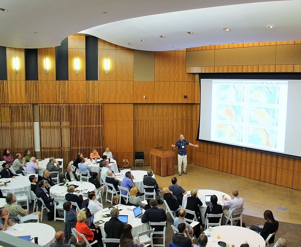 Washington state climatologist Nicholas Bond (on stage) presents his observations on warm sea surface temperatures during a May 2015 conference at Scripps Institution of Oceanography. (Photo  courtesy of Southern California Coastal Ocean Observing System) 