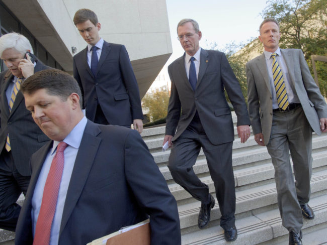 David Rainey, second from right, leaves Federal Court after being arraigned on obstruction of a federal investigation in New Orleans in 2012. Rainey was acquitted Friday. Matthew Hinton/AP