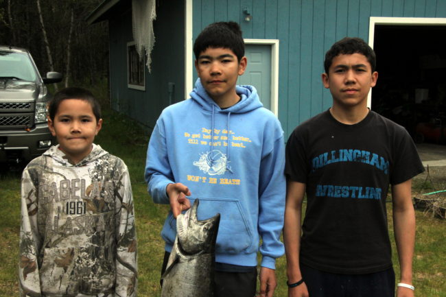 The fishermen responsible for the first 12-lb king: brothers Graelin, Triston and Dillon Chaney (Photo by Hannah Colton/KDLG)