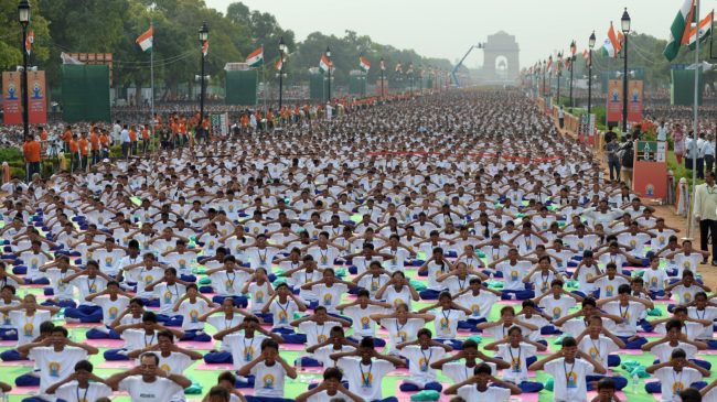 A mass yoga session on Rajpath, New Delhi's ceremonial boulevard, marks International Yoga Day. Prahash Singh/AFP/Getty Images