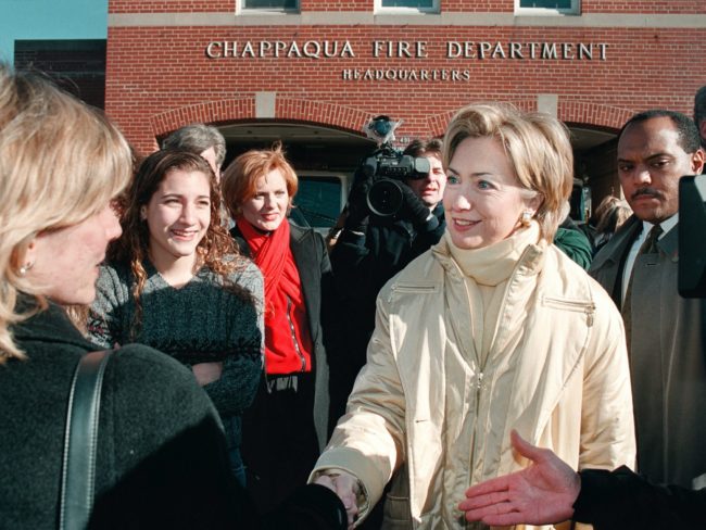 Local residents greet Clinton in front of the Chappaqua Fire Department in 2000. (Photo by Chris Hondros/Getty Images)