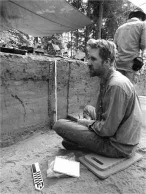 Josh Reuther at an archeological dig in Alaska. (Photo courtesy of UAF)