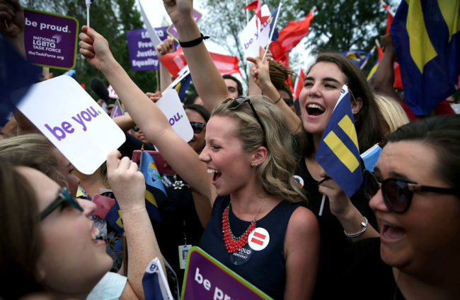 Same-sex marriage supporters rejoice after the U.S Supreme Court hands down a ruling regarding same-sex marriage today outside the Supreme Court in Washington, DC. The high court ruled that same-sex couples have the right to marry in all 50 states. Alex Wong/Getty Images