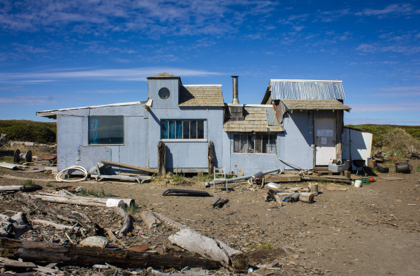 Permanent structures, like the cabin owned by Ian Foster (above), on Nome’s West Beach constitute a hazard and liability according to city officials. (Photo by Francesca Fenzi)