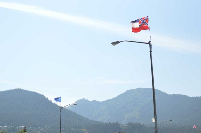 Some residents are asking for the removal of the Mississippi flag on Egan Drive because of the Confederate imagery in its upper left corner. (Photo by Lakeidra Chavis/KTOO)