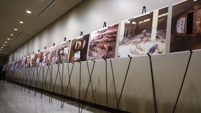 Images of dead bodies in Syrian prisons, taken by a Syrian government photographer, are displayed at the United Nations on March 10. The photographer, who goes by the pseudonym Caesar, took the pictures between 2011, when the Syrian uprising began, and 2013, when he fled the country. His photos will be on display at the U.S. Capitol on Wednesday. Lucas Jackson/Reuters