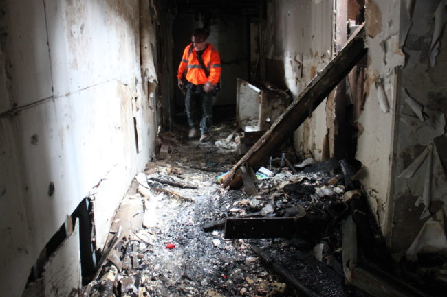 Inside the burned out Gastineau Apartments. (Photo by Lisa Phu/KTOO) 