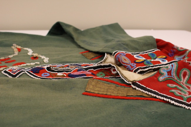 SHI is looking for the tribe the tunic belong to. (Photo by Elizabeth Jenkins/KTOO)