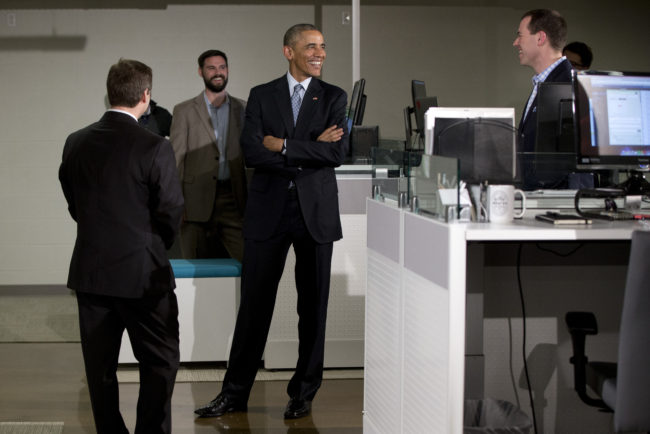 President Obama tours the Louisville-based tech company Indatus with Indatus president Philip Hawkins (left). Carolyn Kaster/AP