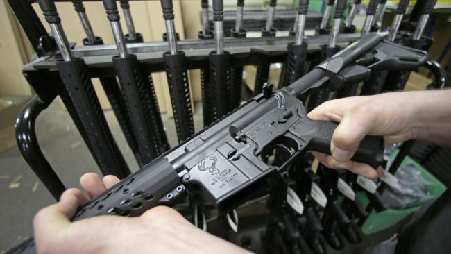 New York state's 2013 gun law includes a ban on the sale of so-called military-style assault weapons like this AR-15 rifle. Charles Krupa/AP